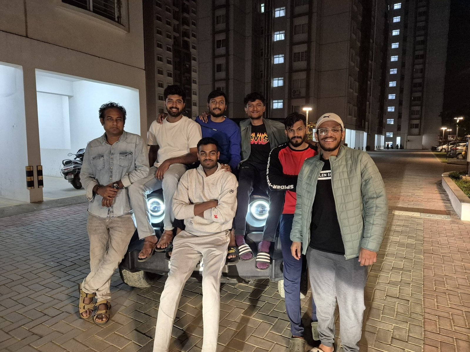 Akash and friends together at night