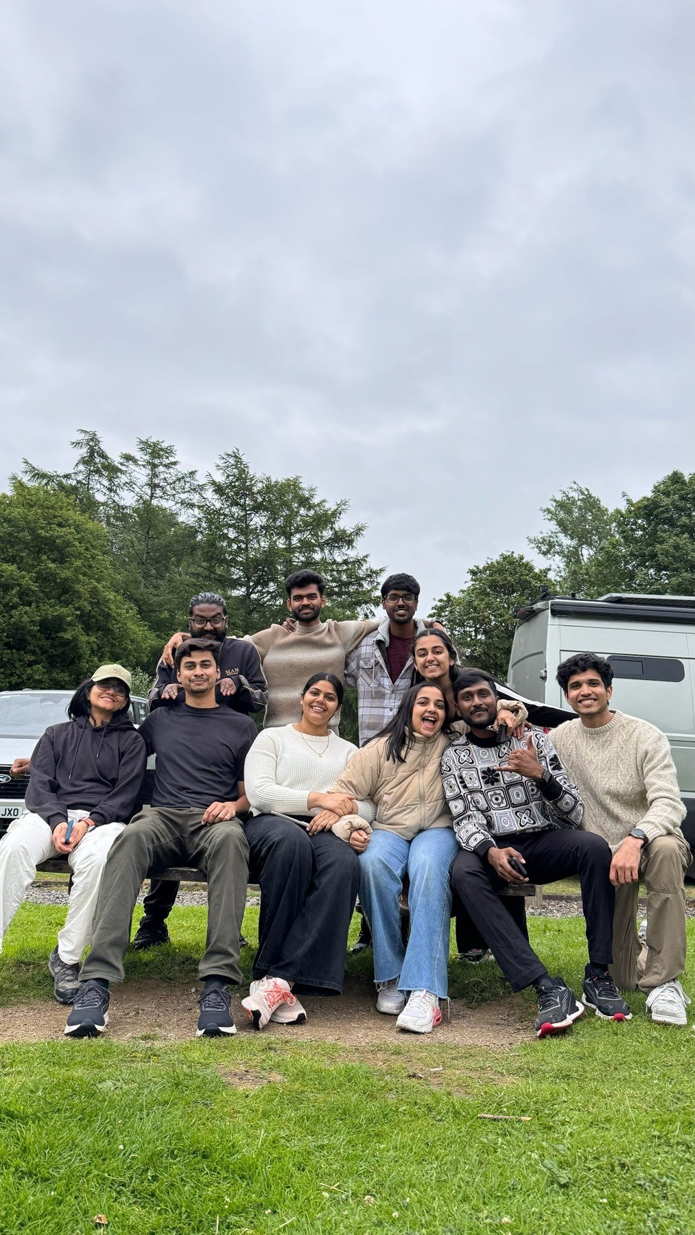 Akash and friends posing together outdoors